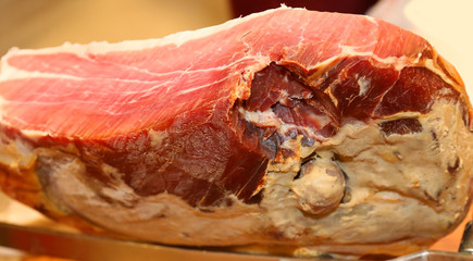 piece of ham in cured meat platter in Italy