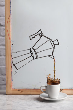 Coffee marker serving coffee in a cup