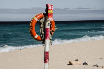 Aid station on a white sand beach
