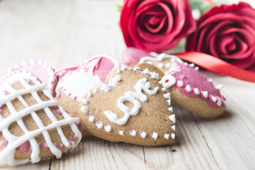 Festive cookies with hearts and roses for Valentine's Day.