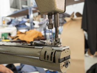 double needles on sewing machine in textile factory.