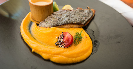 Grilled salmon and pumpkin cream