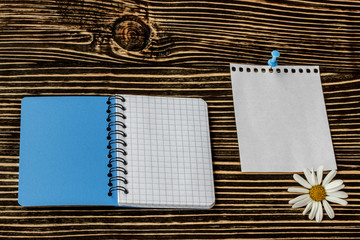 blank notebook  on wooden table