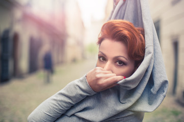 Young woman posing on the street