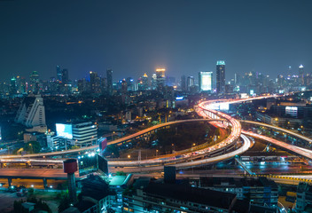 Fototapeta na wymiar Aerial view of Bangkok city downtown background, highway interch