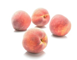 Ripe peach fruit isolated on white background
