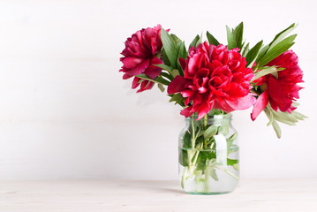 bouquet of peonies on the table
