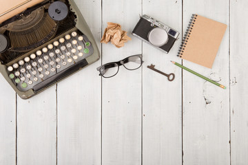 writer's workplace - wooden desk with typewriter