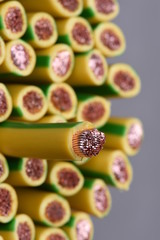 Group of yellow and green earth cables and selective focus on one closeup