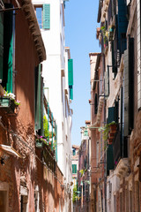 Naklejka premium Narrow street from Venice, Italy