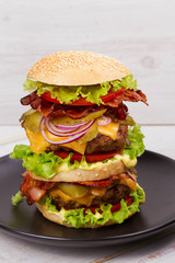 Burger With Beef, Bacon, Tomato, Cheese, Lettuce and Onion