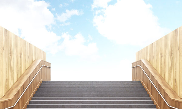 Stairs leading to bright sky