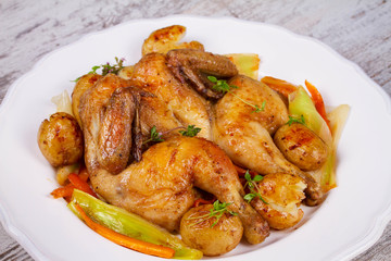 Roasted chicken with potato, carrot, leek and thyme