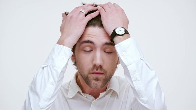 Man fixing his hair. Close up. Slow motion