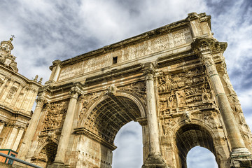 Fototapeta na wymiar Triumphal Arch of Septimius Severus in the Roman Forum, Italy