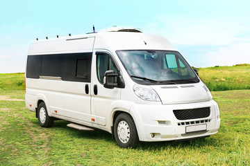 white minibus on in the field