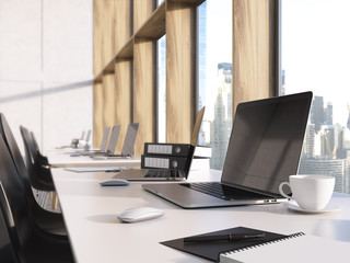 Blank laptop on desktop