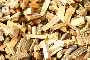 Firewood background - chopped firewood