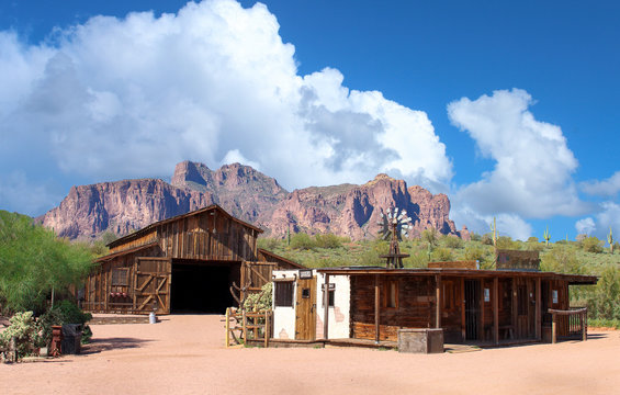 Abandoned Wild West town - Old Wild West town with mountains range in background