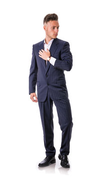 Full length shot of elegant young man with suit