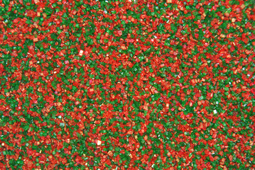 Christmas Sprinkles Candy Sugar in Red and Green Background