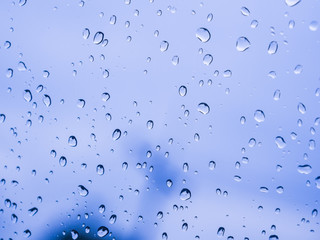 Close up water drops on blue background