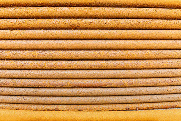 Rusty metal tube background texture