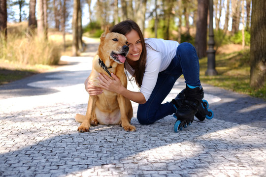 Female with brown dog.