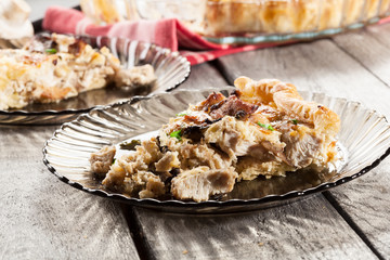 Slice of tart with chicken amd mushrooms