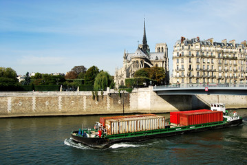 Transport of containers on the Seine in Paris - obrazy, fototapety, plakaty
