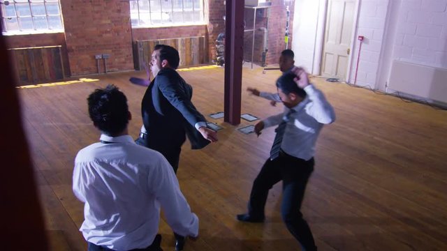  Handsome businessman or special agent character outnumbered in a fight 