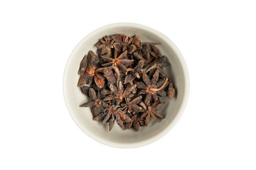 bowl of anise seed on a white background