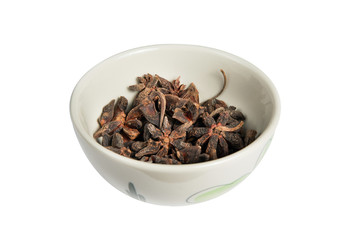 bowl of anise seed on a white background