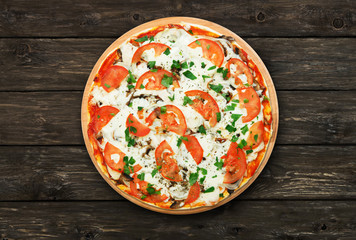 Delicious pizza with mushrooms and meat