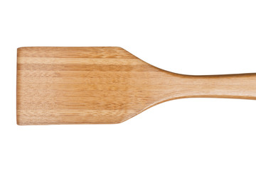 wooden food turner on white.