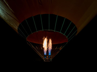 Fire of flying air balloon at night