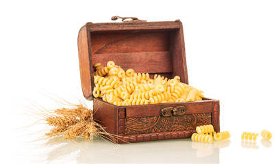 Pasta in chest and ears of wheat isolated on white 