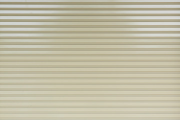 Obraz premium roller shutter door in warehouse building