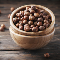 Healthy raw hazelnut on the wooden table