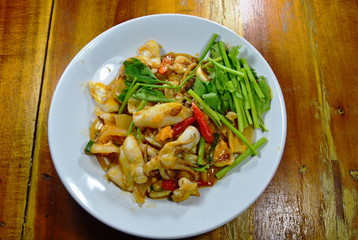 stir-fried squid with salt egg on dish