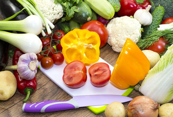 Background of fresh vegetables and greens closeup