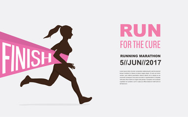 number one winner at a finish  line. breast cancer awareness. run for  good  cause