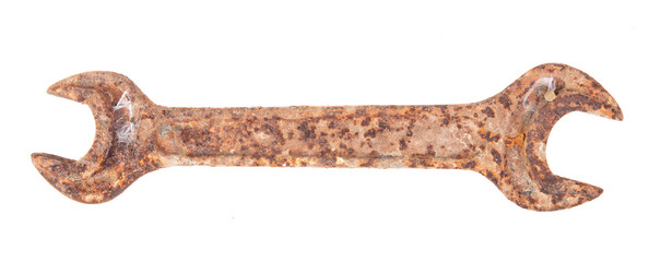 old rusty spanner isolated on white background