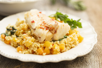 Pumpkin risotto with cod and sweet pepper