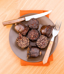 Vertical making fried black pudding