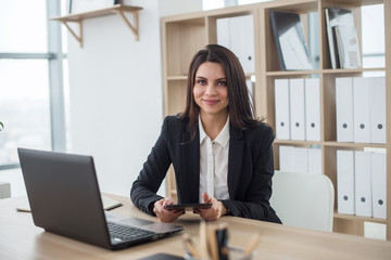 business woman with notebook in office, workplace