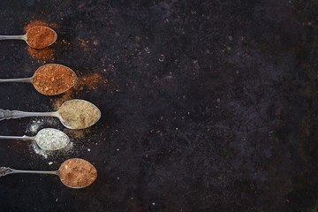 Spices on spoons © salmiska07