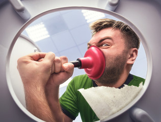 Man with cup plunger