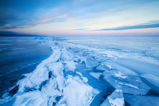 crack in the ice of Lake Baikal at dawn