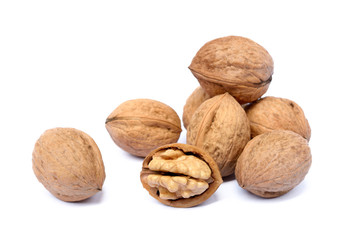 Fresh walnut with a shell isolated on white background